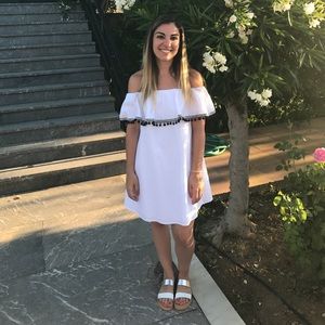 Off the shoulder white pom pom dress